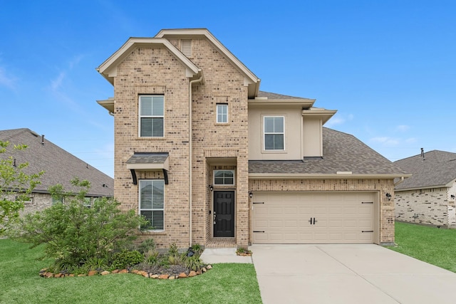 14031 Little River Dr, Baytown, TX 77523 - view of front of property with brick siding, concrete driveway, and a front lawn