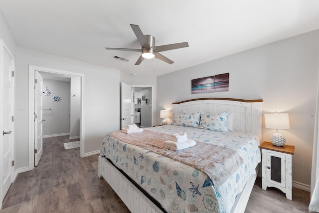7600 Seawall Blvd Unit 214, Galveston, TX 77551 - bedroom featuring wood finished floors and a ceiling fan