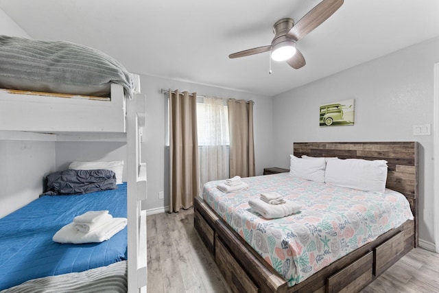 7600 Seawall Blvd Unit 214, Galveston, TX 77551 - bedroom featuring wood finished floors and a ceiling fan