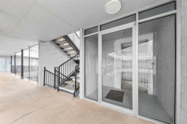 7600 Seawall Blvd Unit 214, Galveston, TX 77551 - entrance to property featuring stucco siding and a patio