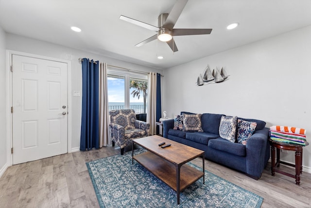7600 Seawall Blvd Unit 214, Galveston, TX 77551 - living room with light wood-style flooring, a ceiling fan, and recessed lighting