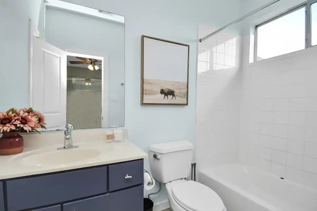 bathroom featuring toilet, a ceiling fan, bathing tub / shower combination, and vanity