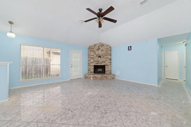 13523 Bonilla Ln, Houston, TX 77083 - unfurnished living room featuring a ceiling fan, a large fireplace, vaulted ceiling, tile patterned floors, and baseboards