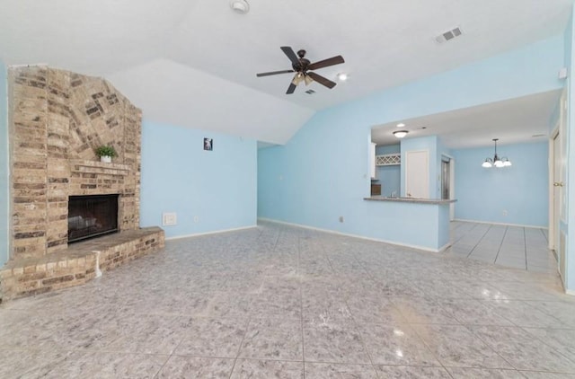 13523 Bonilla Ln, Houston, TX 77083 - unfurnished living room featuring a fireplace, vaulted ceiling, a chandelier, ceiling fan, and baseboards
