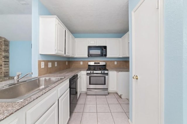 13523 Bonilla Ln, Houston, TX 77083 - kitchen featuring black appliances, a sink, white cabinets, light countertops, and a textured ceiling