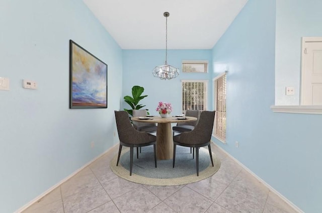 13523 Bonilla Ln, Houston, TX 77083 - dining room featuring a chandelier, tile patterned floors, and baseboards