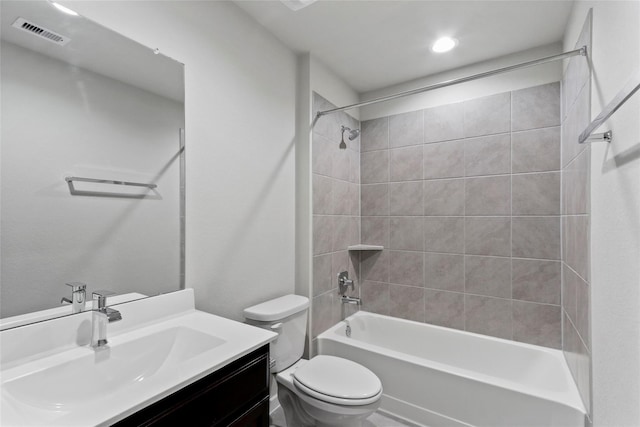 full bathroom with toilet, vanity, bathing tub / shower combination, and visible vents