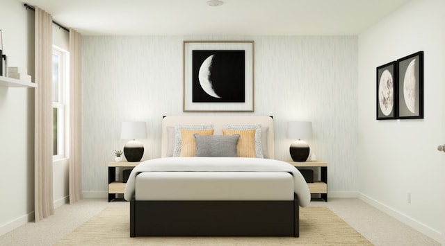 carpeted bedroom with baseboards