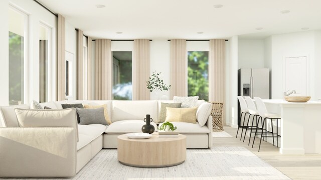 living area with light wood-style floors