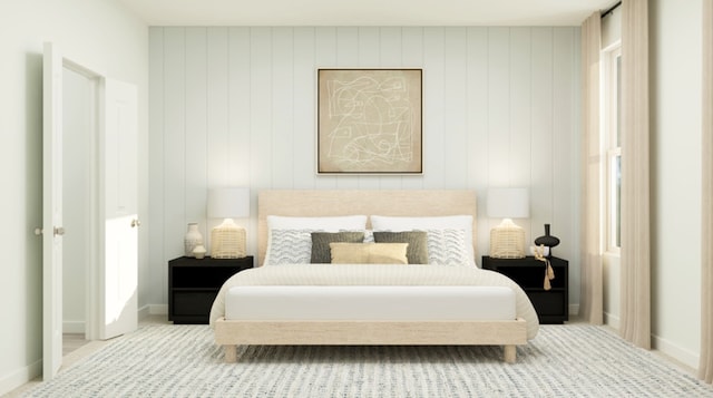bedroom featuring baseboards