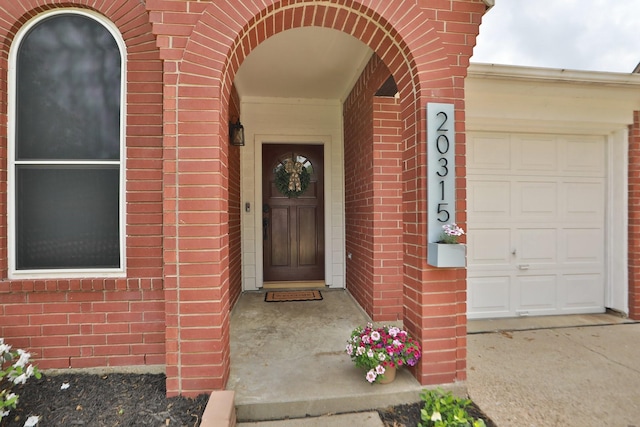 20315 Maple Village Dr, Cypress, TX 77433 - view of exterior entry featuring brick siding