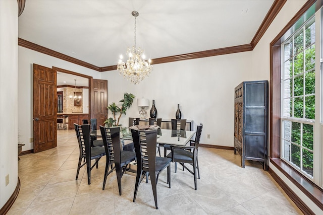dining room featuring light tile patterned flooring, a chandelier, ornamental molding, and baseboards