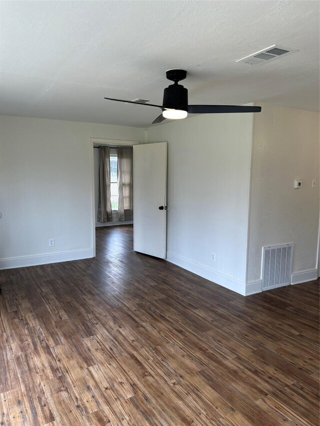 304 Tanner Ave, Cleveland, TX 77327 - empty room featuring baseboards, dark wood finished floors, and a ceiling fan