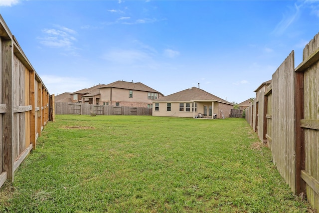 2225 Windy Sail Dr, Texas City, TX 77568 - view of yard featuring a fenced backyard