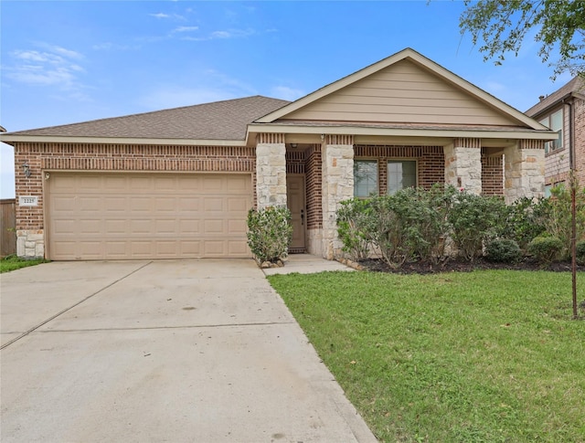 2225 Windy Sail Dr, Texas City, TX 77568 - ranch-style home featuring a garage, a front yard, driveway, and stone siding