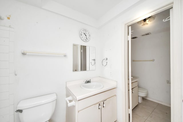 9654 Westview Dr Unit 9, Houston, TX 77055 - full bath featuring toilet, vanity, and tile patterned floors
