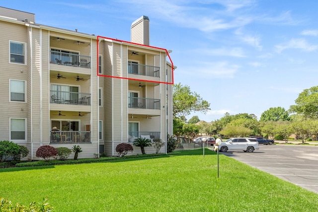12800 Melville Dr Unit B307, Montgomery, TX 77356 - view of property featuring uncovered parking