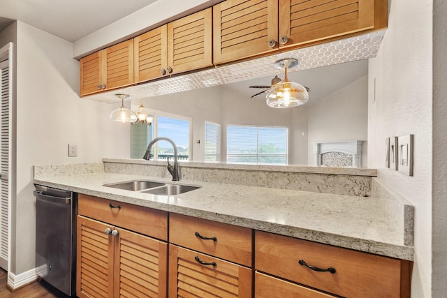 12800 Melville Dr Unit B307, Montgomery, TX 77356 - kitchen featuring a sink, dishwasher, a ceiling fan, light stone countertops, and decorative light fixtures