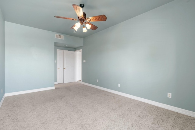 12800 Melville Dr Unit B307, Montgomery, TX 77356 - unfurnished room with ceiling fan, baseboards, and carpet floors