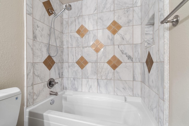 12800 Melville Dr Unit B307, Montgomery, TX 77356 - bathroom with bathtub / shower combination, toilet, and a textured wall