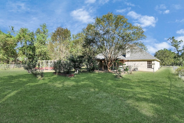 view of yard with fence
