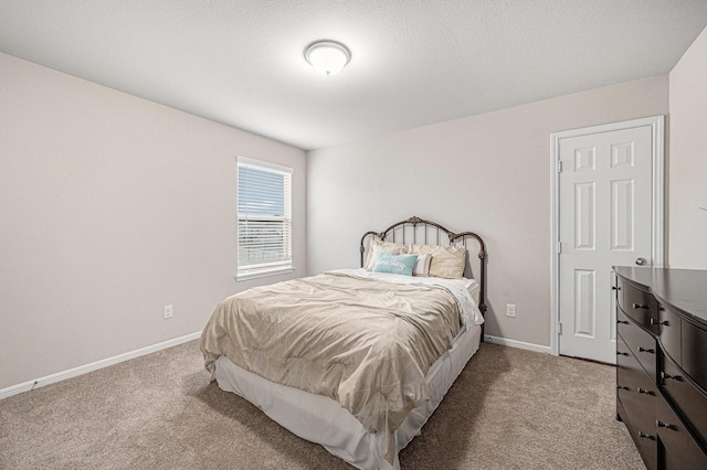 408 Long Beach Bay Dr, Katy, TX 77493 - bedroom featuring light carpet and baseboards