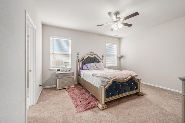 408 Long Beach Bay Dr, Katy, TX 77493 - carpeted bedroom with multiple windows and a ceiling fan