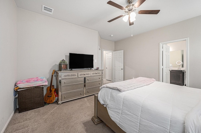 408 Long Beach Bay Dr, Katy, TX 77493 - bedroom with light carpet, ceiling fan, and ensuite bathroom