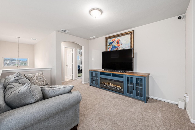 408 Long Beach Bay Dr, Katy, TX 77493 - living room with arched walkways and carpet