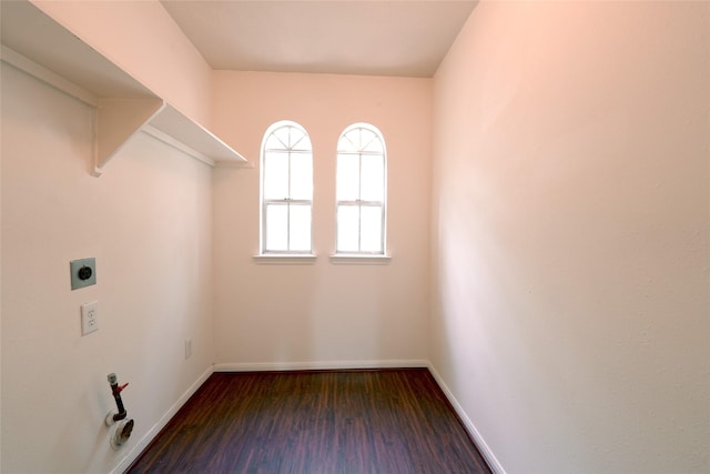 washroom featuring baseboards, laundry area, wood finished floors, and electric dryer hookup