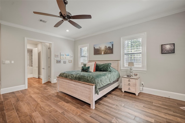 27415 Siandra Creek Ln, Spring, TX 77386 - bedroom featuring multiple windows, light wood-type flooring, crown molding, baseboards, and recessed lighting