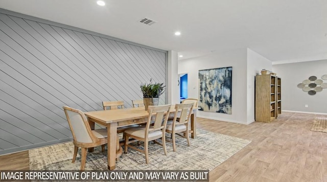 dining area with recessed lighting, visible vents, and light wood-type flooring