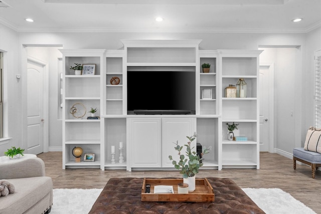 13130 Victoria Trce, Montgomery, TX 77316 - living area featuring recessed lighting, wood finished floors, crown molding, and baseboards