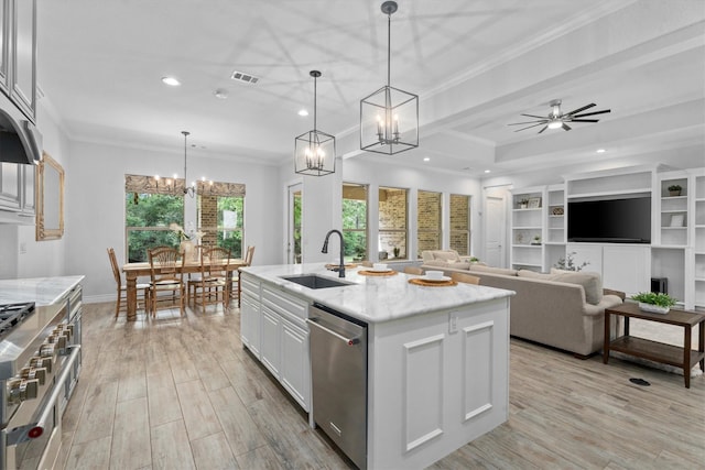 13130 Victoria Trce, Montgomery, TX 77316 - kitchen with recessed lighting, stainless steel appliances, visible vents, a sink, and light stone countertops