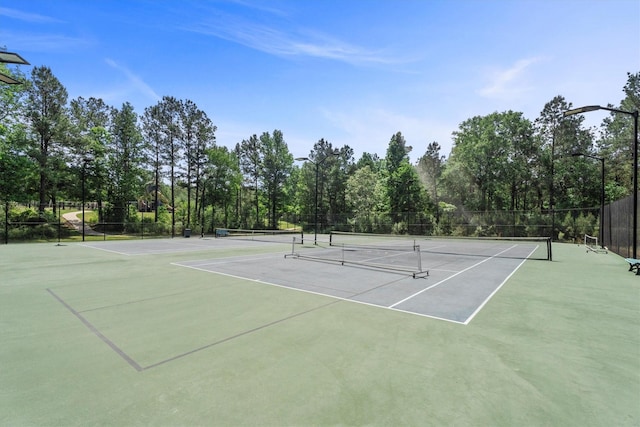 13130 Victoria Trce, Montgomery, TX 77316 - view of sport court featuring community basketball court and fence