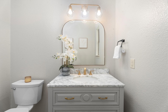 13130 Victoria Trce, Montgomery, TX 77316 - bathroom with vanity and toilet