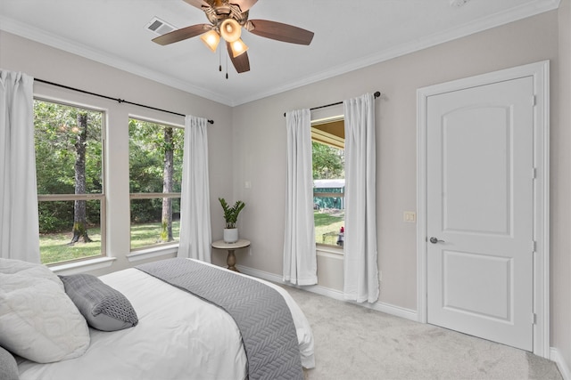 13130 Victoria Trce, Montgomery, TX 77316 - carpeted bedroom featuring baseboards, visible vents, ornamental molding, and ceiling fan