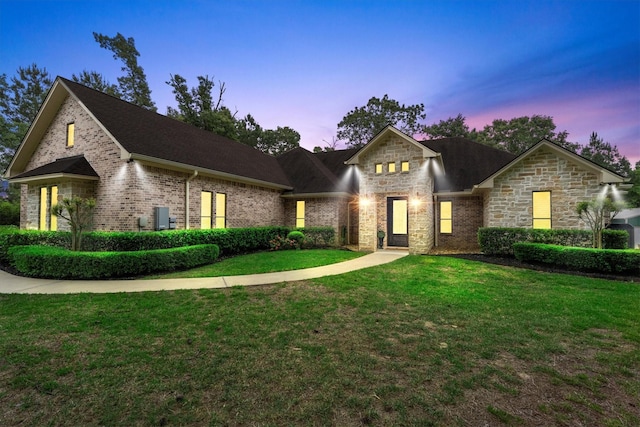 13130 Victoria Trce, Montgomery, TX 77316 - view of front of property with brick siding and a yard