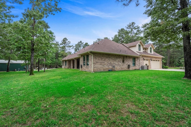 13130 Victoria Trce, Montgomery, TX 77316 - view of side of home featuring an attached garage, a lawn, driveway, and brick siding