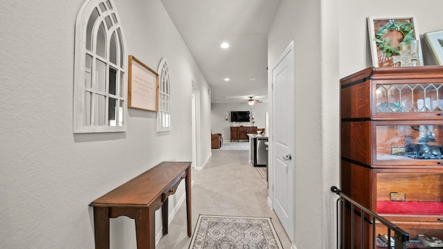 hall with recessed lighting