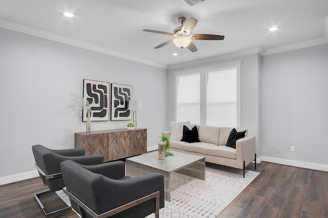living area featuring crown molding, a ceiling fan, baseboards, and wood finished floors