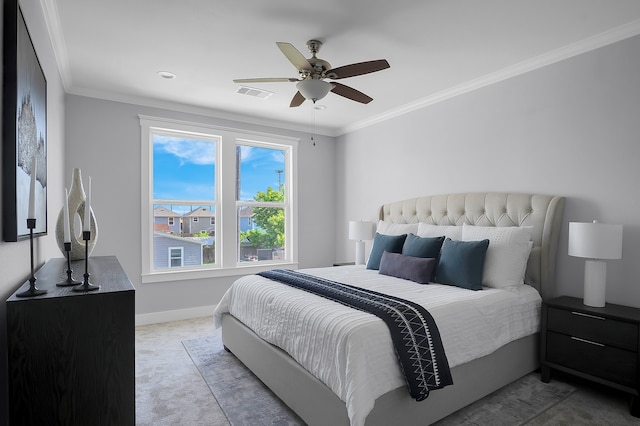 bedroom with carpet flooring, crown molding, a ceiling fan, baseboards, and visible vents