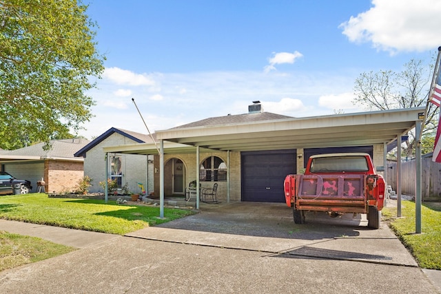 view of front of house with a front yard, an attached garage, fence, brick siding, and driveway