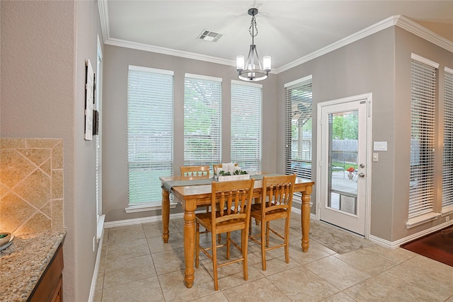 12203 Pinelands Park Ln, Humble, TX 77346 - dining space with a chandelier, crown molding, baseboards, and light tile patterned floors