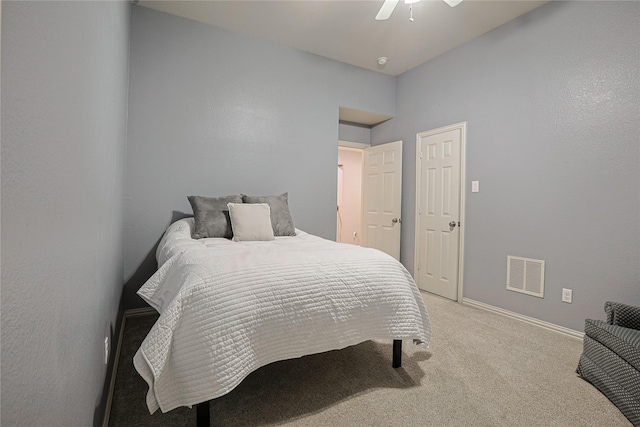 12203 Pinelands Park Ln, Humble, TX 77346 - bedroom with light carpet, baseboards, and ceiling fan