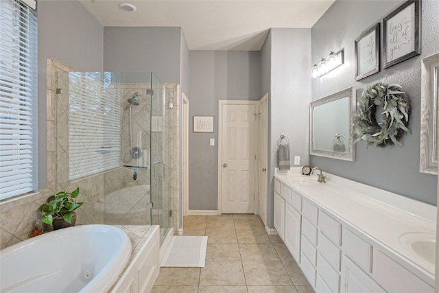 12203 Pinelands Park Ln, Humble, TX 77346 - full bathroom with a shower stall, a whirlpool tub, double vanity, and tile patterned flooring