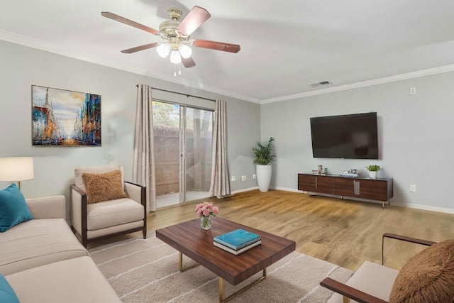 4119 Medical Dr Unit E104, San Antonio, TX 78229 - living area featuring ceiling fan, visible vents, wood finished floors, baseboards, and ornamental molding
