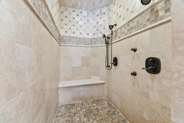 full bathroom featuring a tile shower