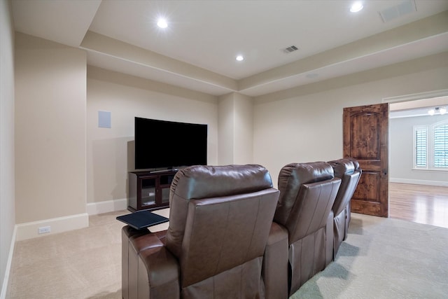 home theater featuring visible vents, baseboards, recessed lighting, and light carpet