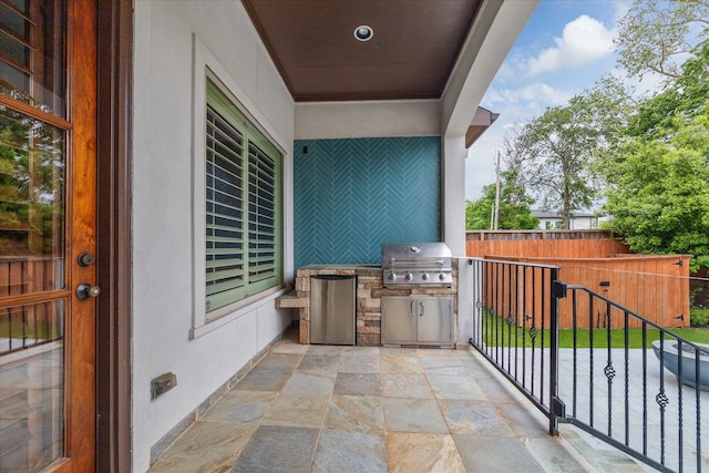 exterior space featuring a grill
